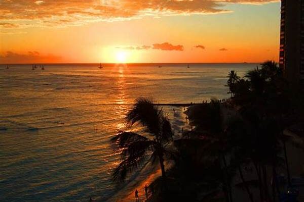 Enjoying The Sunset At Waikiki Beach Hawaii